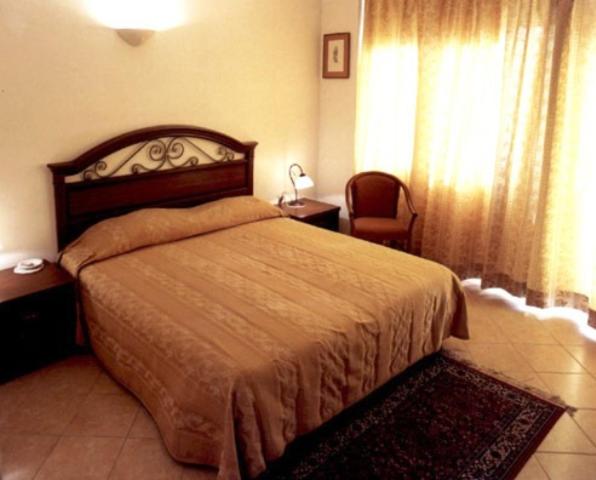 Postel nebo postele na pokoji v ubytování Hotel Cuor Di Puglia