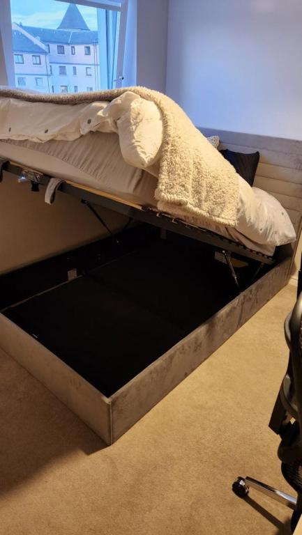 Ένα ή περισσότερα κρεβάτια σε δωμάτιο στο Modern Room in a Shared Flat near Haymarket