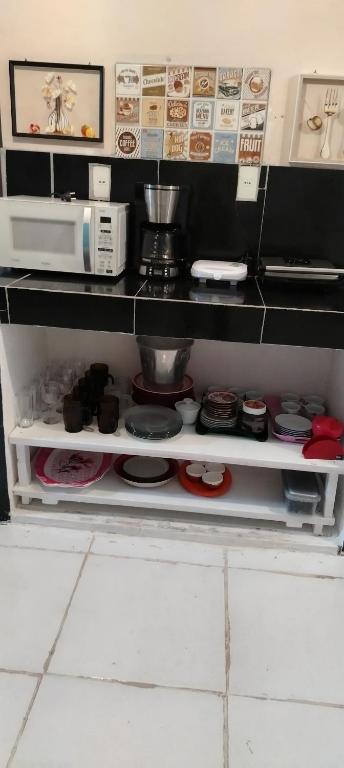 A kitchen or kitchenette at Hostal Maison Belle