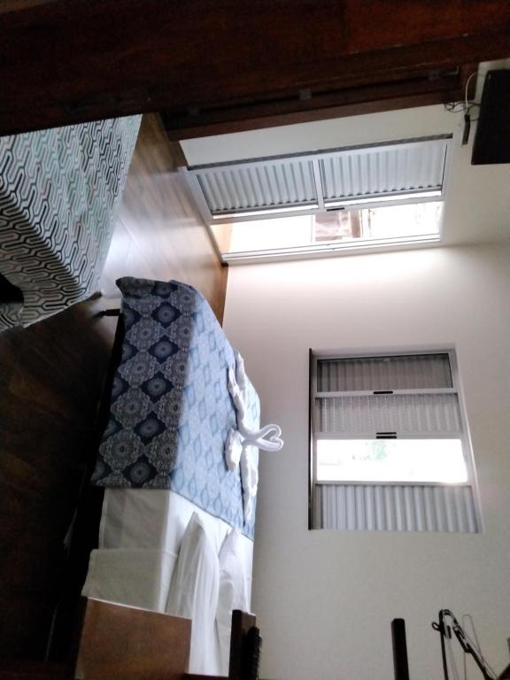Cama ou camas em um quarto em Pousada Portal da Lua