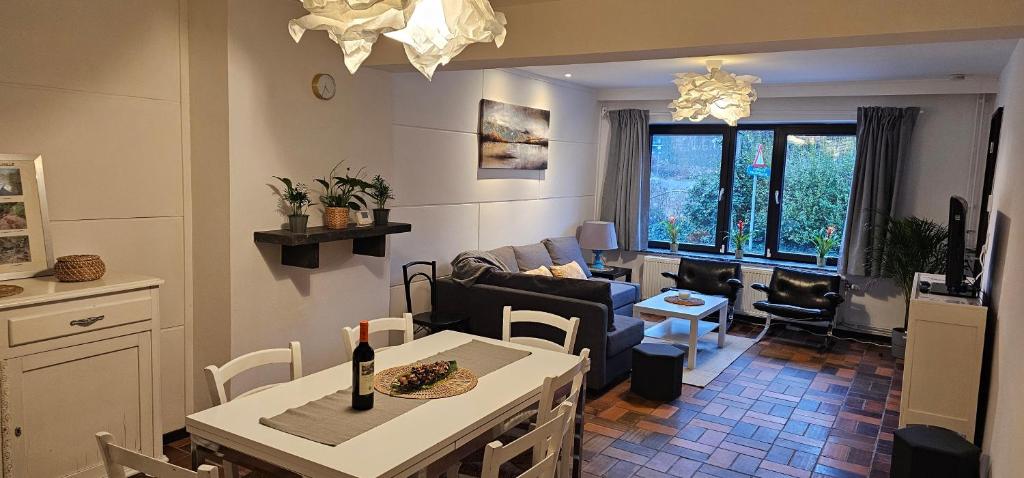 Posezení v ubytování Le Relais des Carriers