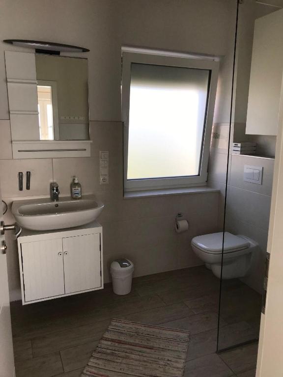 Koupelna v ubytování Strandhaus-Appartment-Rauchschwalbe