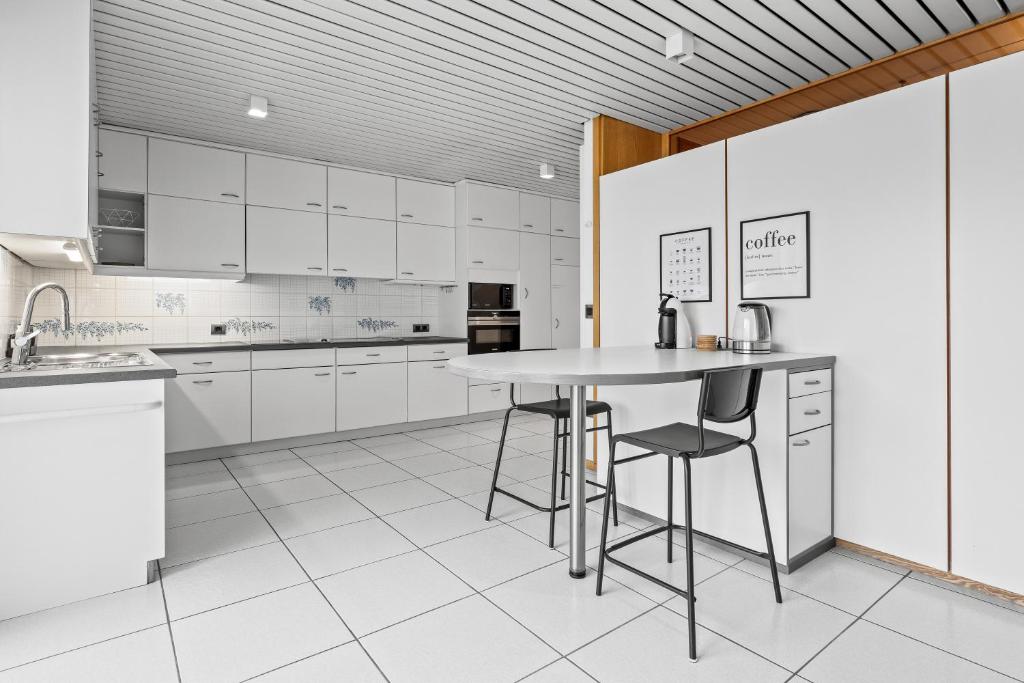 Kuchyň nebo kuchyňský kout v ubytování Chambre privée au coeur de Bascharage
