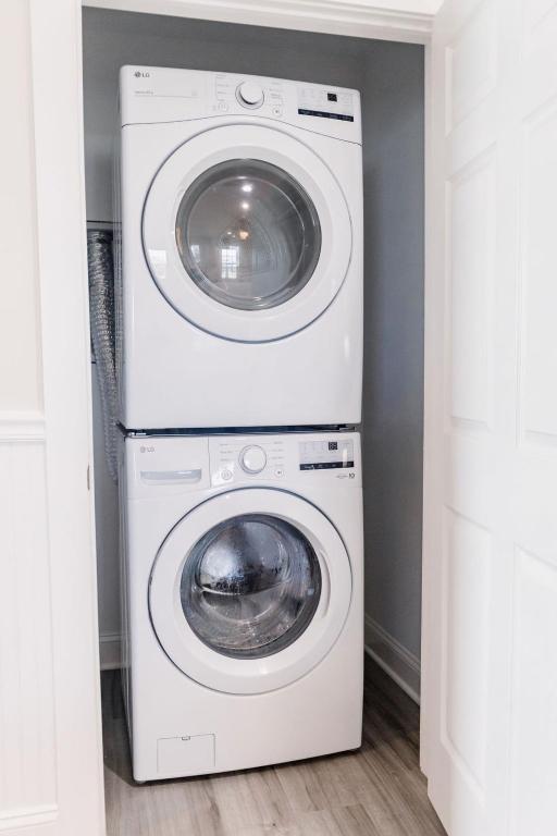 a white washer and dryer in a laundry room at 3005 Queen Suite, 3rd Floor Surfside in Surf City