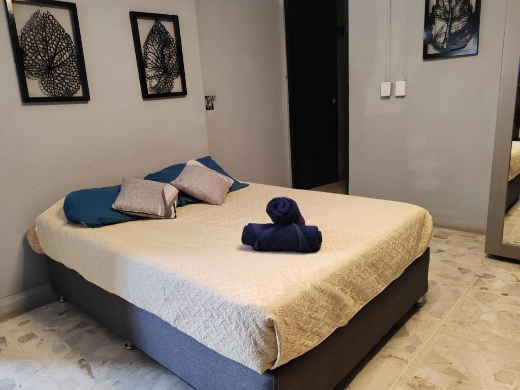 Postel nebo postele na pokoji v ubytování Hostal vitta
