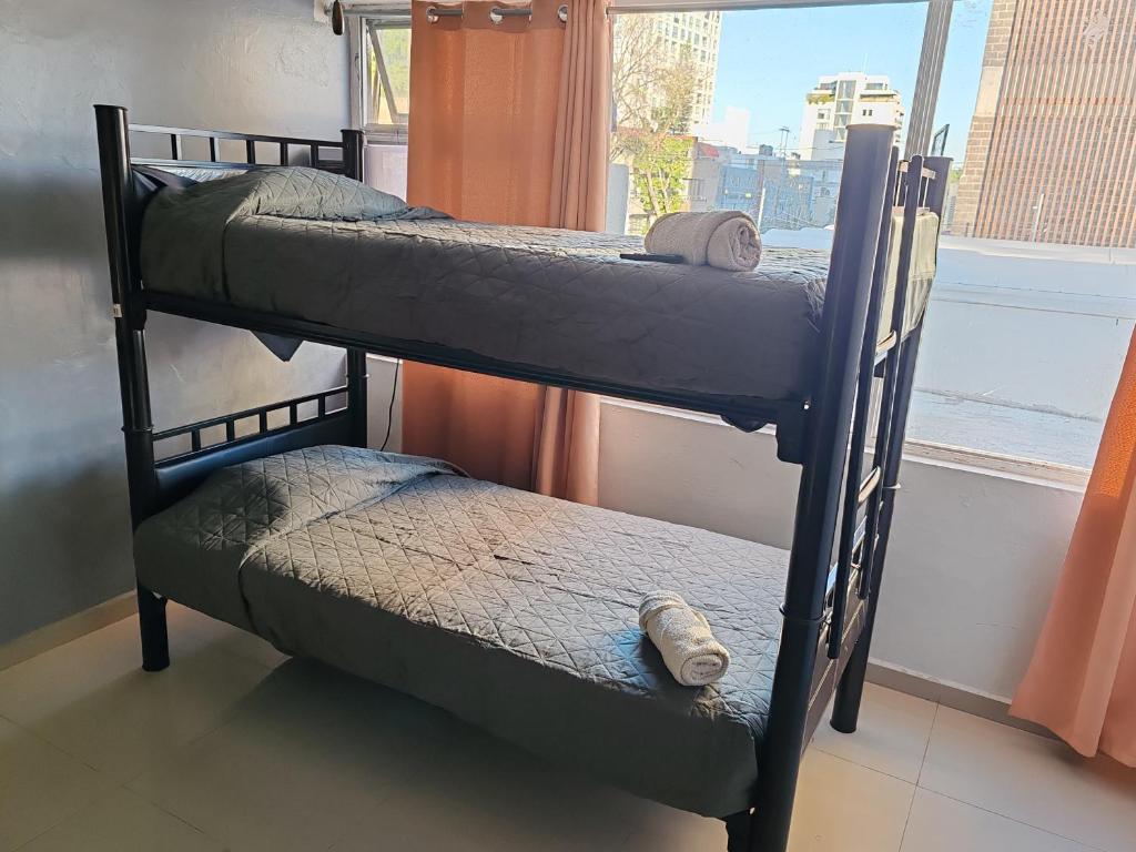 Postel nebo postele na pokoji v ubytování Hostal vitta