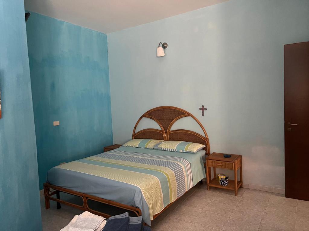 Postel nebo postele na pokoji v ubytování Tranquillo appartamento immerso nel verde