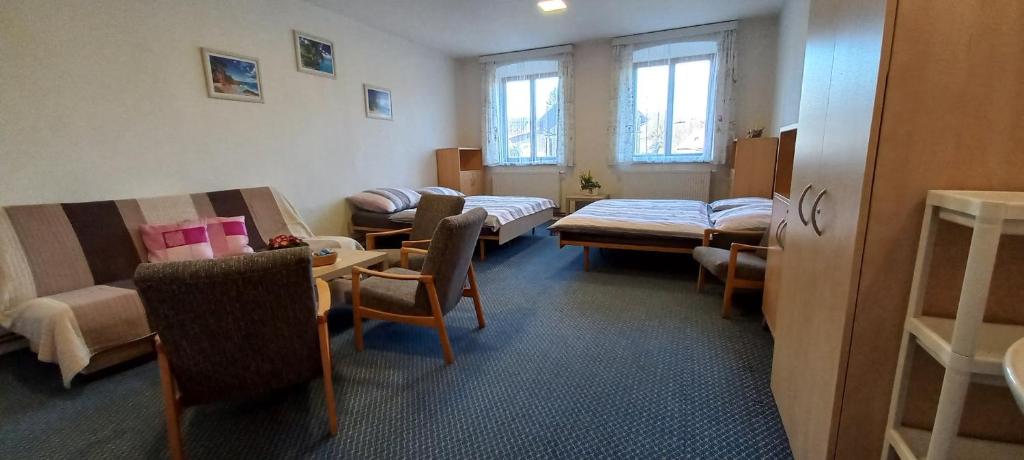 Postel nebo postele na pokoji v ubytování Prázdninový dům Sloup - Sloup v Čechách