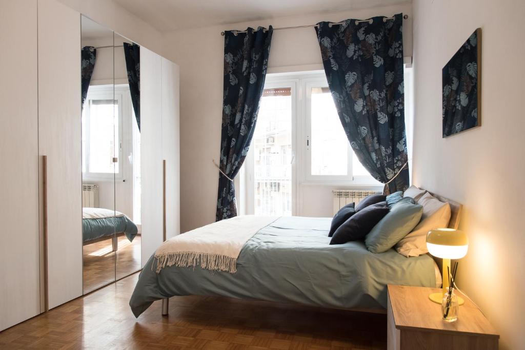 Letto o letti in una camera di Casa Eva - Roma