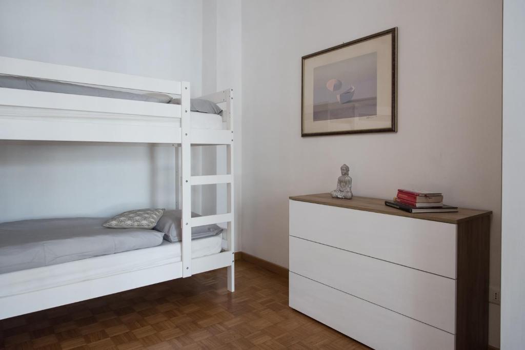 Letto o letti in una camera di Casa Eva - Roma