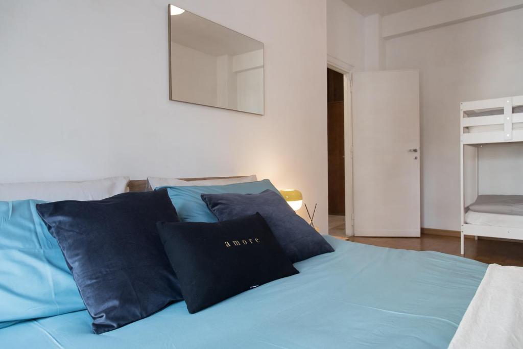 Letto o letti in una camera di Casa Eva - Roma