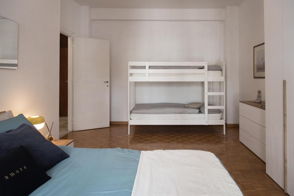 Letto o letti in una camera di Casa Eva - Roma