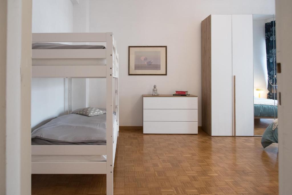 Letto o letti in una camera di Casa Eva - Roma