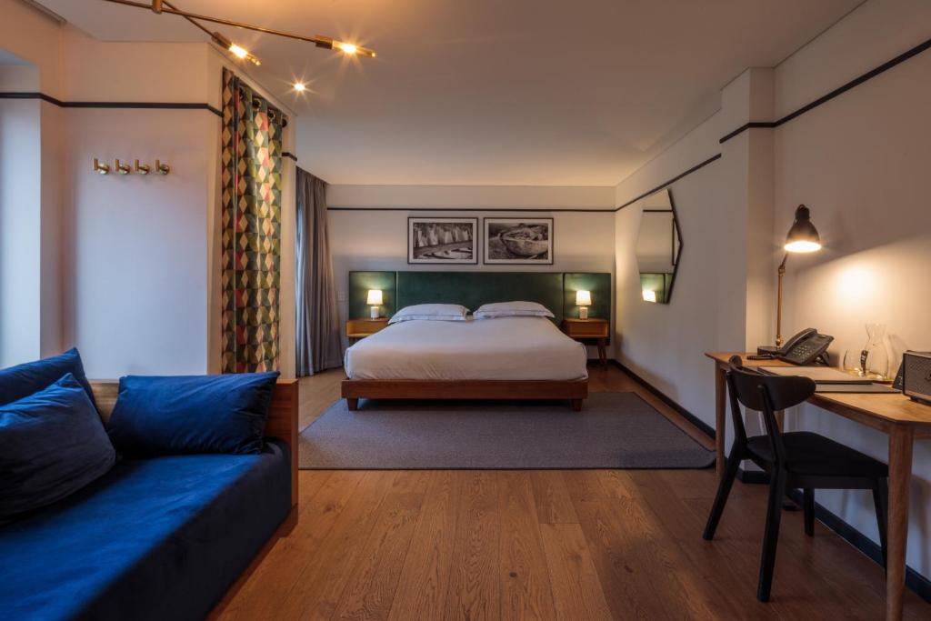 Postel nebo postele na pokoji v ubytování HAB Hotel Bogotá