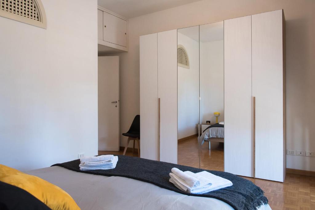 Letto o letti in una camera di Casa Eva - Roma