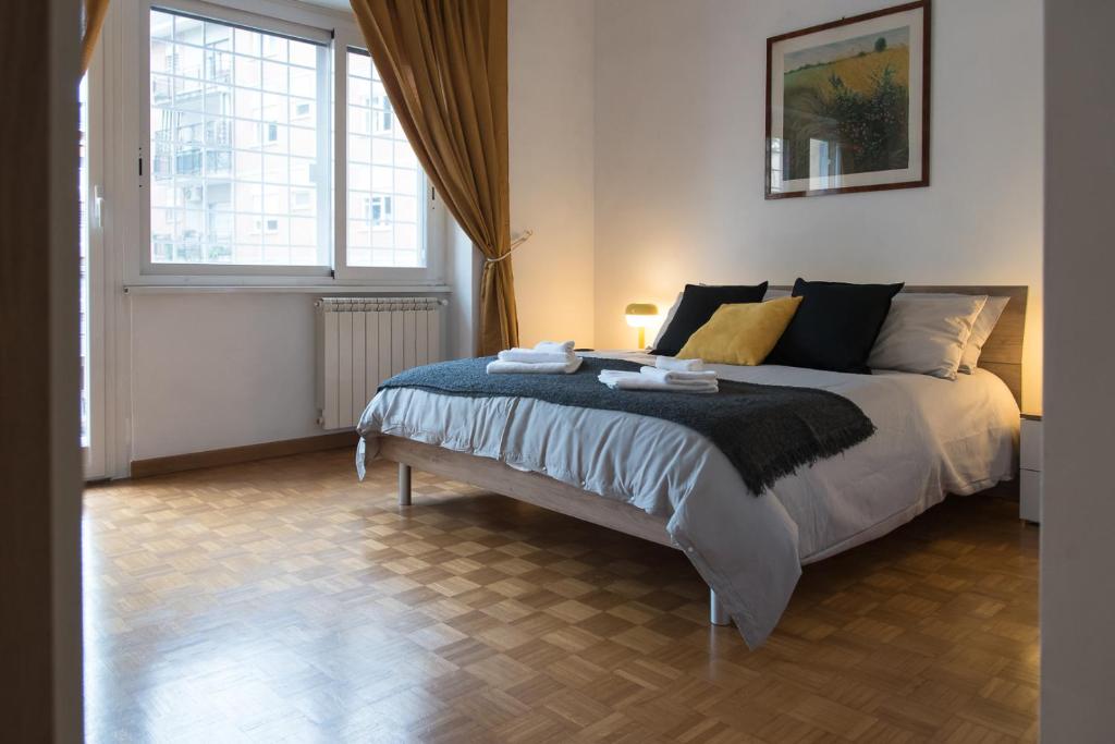 Letto o letti in una camera di Casa Eva - Roma