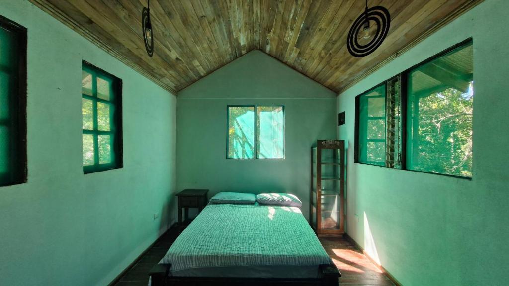 Postel nebo postele na pokoji v ubytování PachaMama Bio