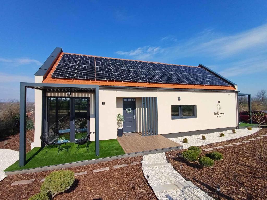 a small house with solar panels on the roof at Holiday home in Eger - Ostungarn 53339 in Eger