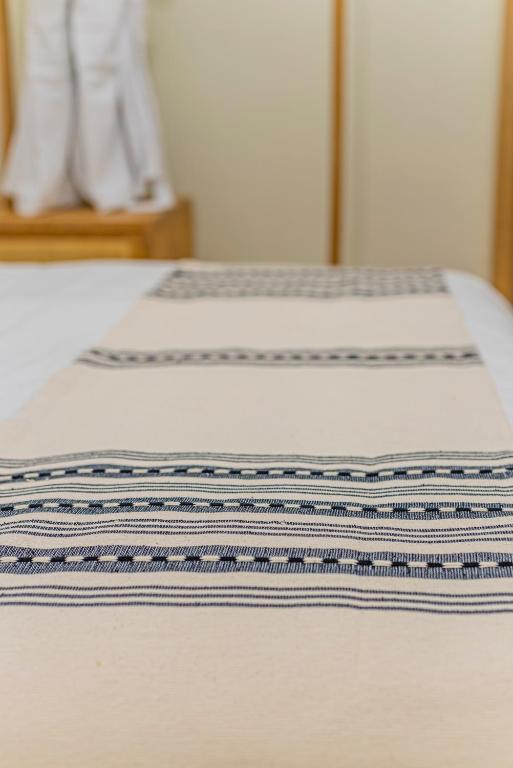 Postel nebo postele na pokoji v ubytování Casona Quetzal