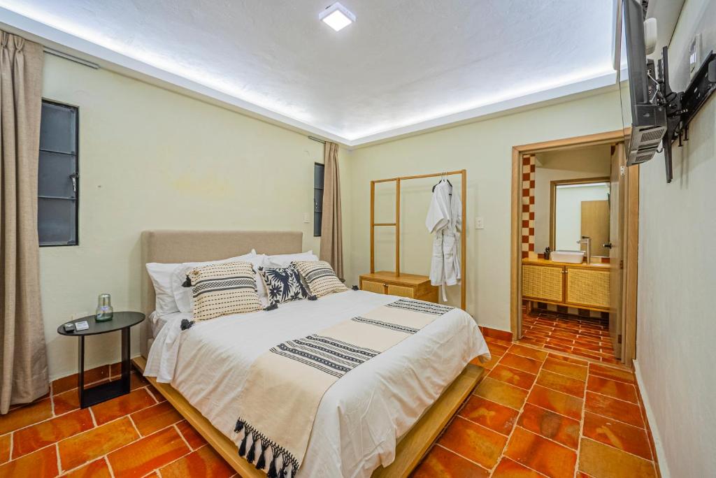 Postel nebo postele na pokoji v ubytování Casona Quetzal