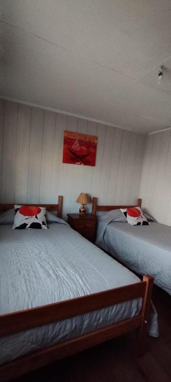 Postel nebo postele na pokoji v ubytování Hostal Maravillas del Sur
