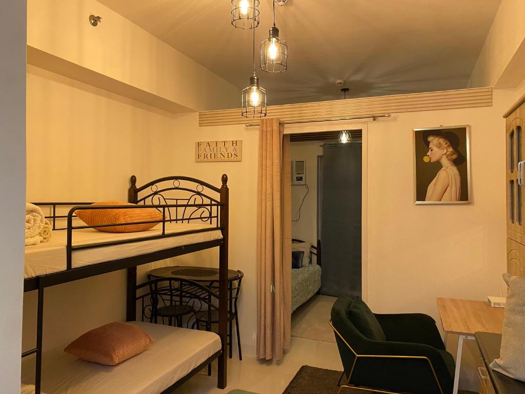Postel nebo postele na pokoji v ubytování Moldex residences Silang