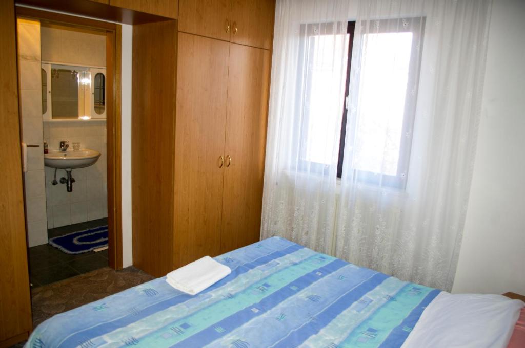 Postel nebo postele na pokoji v ubytování Rooms Hunter
