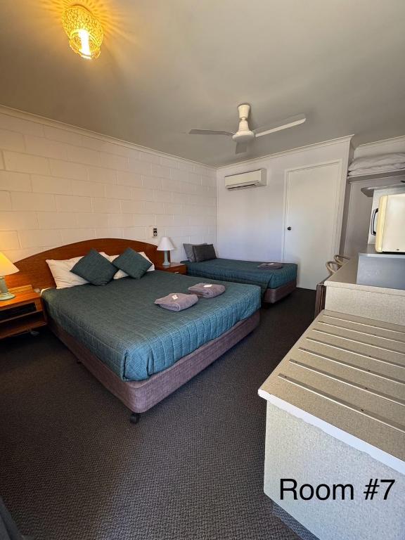 Postel nebo postele na pokoji v ubytování Warrego Motel