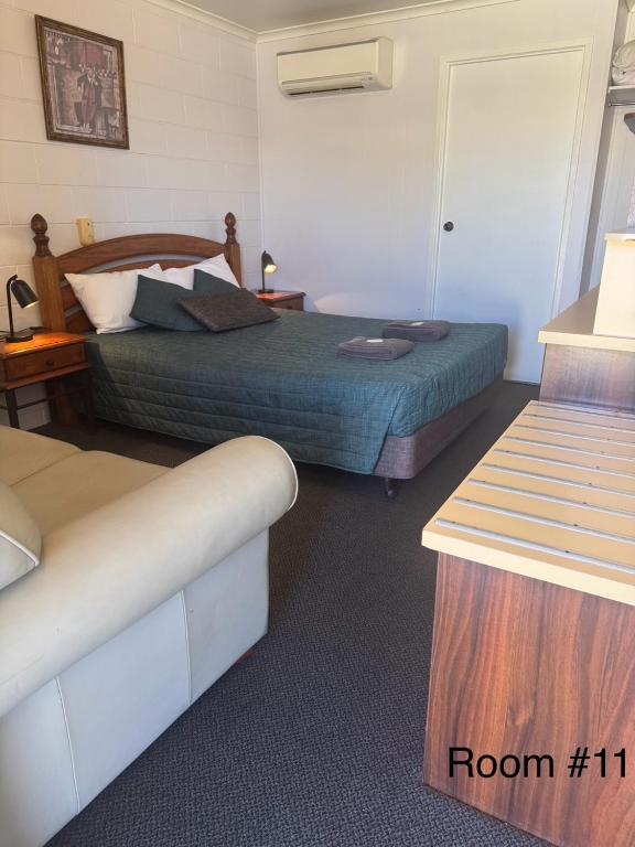 Postel nebo postele na pokoji v ubytování Warrego Motel
