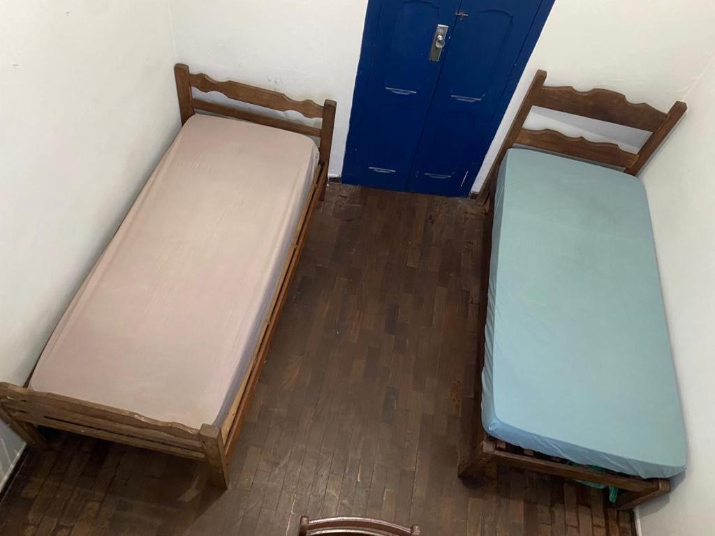 Ένα ή περισσότερα κρεβάτια σε δωμάτιο στο Republica Cruz Vermelha