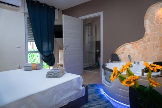 Postel nebo postele na pokoji v ubytování B&B Suite Penelope