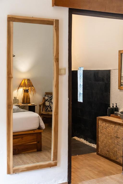 Postel nebo postele na pokoji v ubytování VILLA BAGUS - adults only hideaway