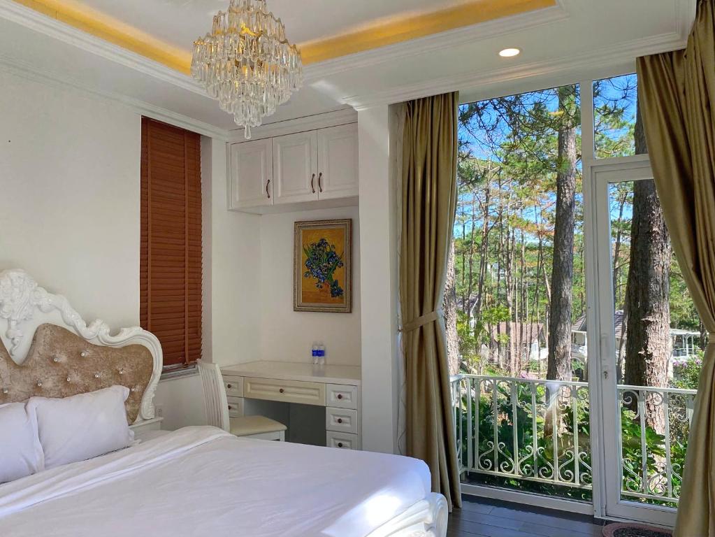 Ein Bett oder Betten in einem Zimmer der Unterkunft Lan Anh Villas Resort