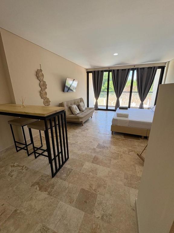 Postel nebo postele na pokoji v ubytování Forest Condominio