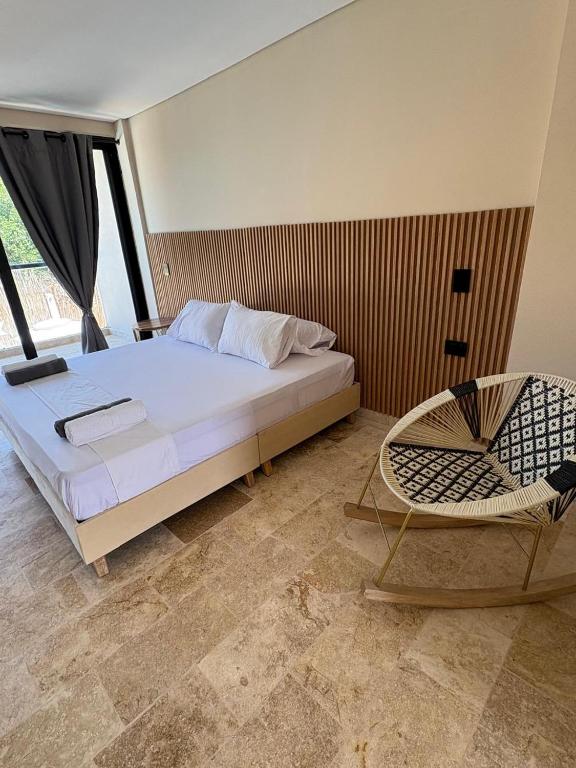 Postel nebo postele na pokoji v ubytování Forest Condominio
