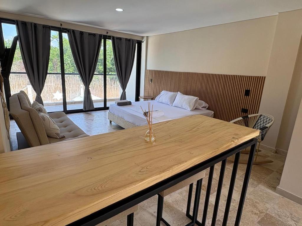 Postel nebo postele na pokoji v ubytování Forest Condominio