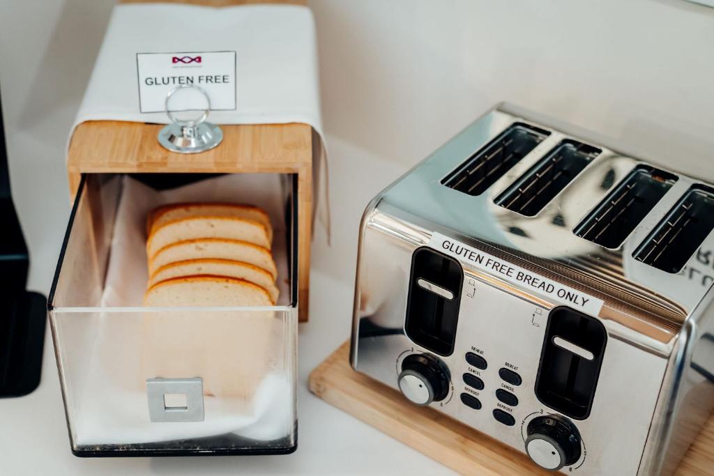 a toaster with two slices of bread in it at Mary MacKillop Place in Sydney