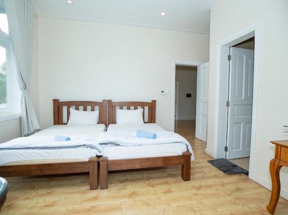 Postel nebo postele na pokoji v ubytování Villa Sea Links ( Biệt Thự nghỉ dưỡng )
