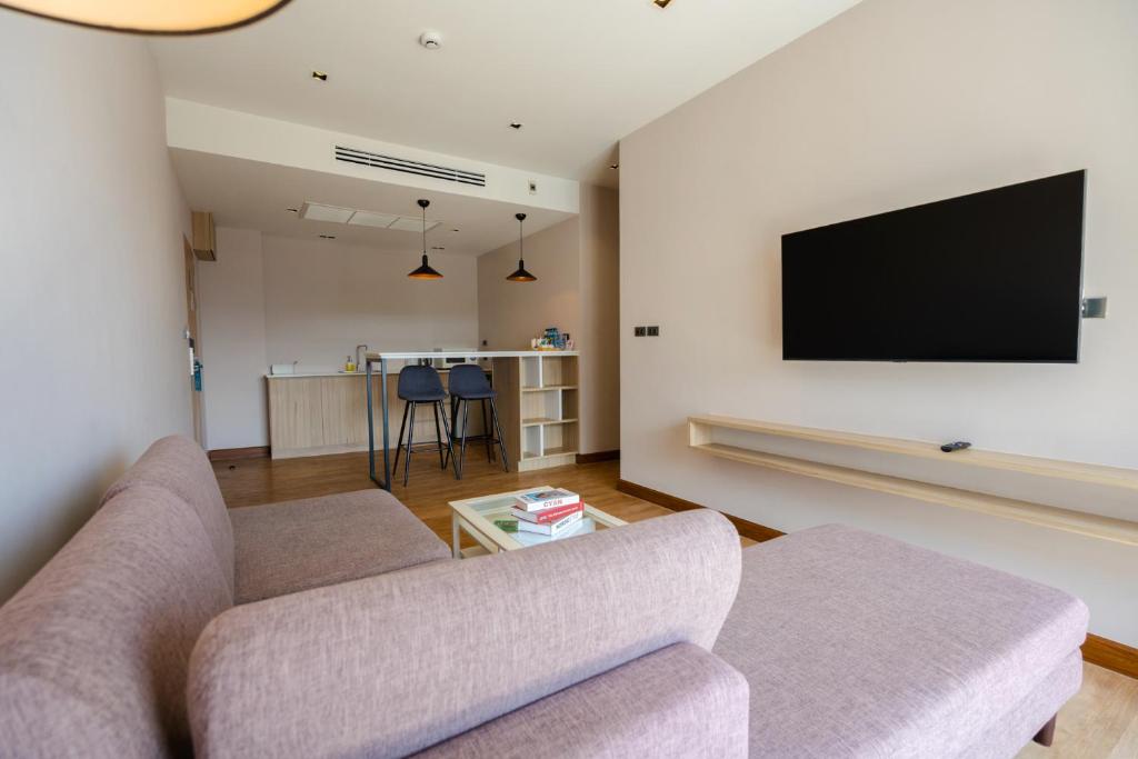 TV a/nebo společenská místnost v ubytování W3 Hotel