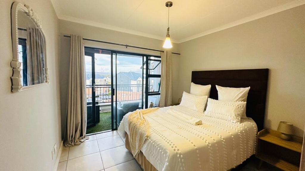 Ένα ή περισσότερα κρεβάτια σε δωμάτιο στο Bookings At The Blyde Crystal Lagoon