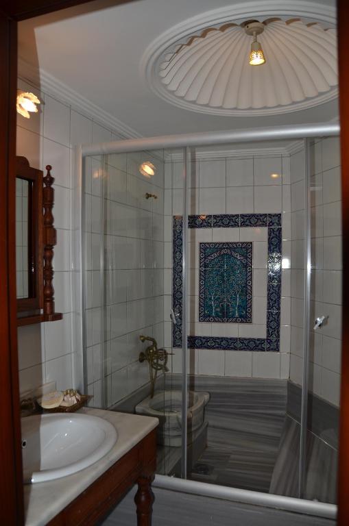Koupelna v ubytování Aruna Boutique Hotel