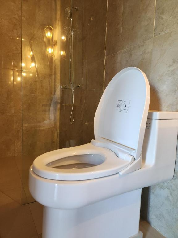 Koupelna v ubytování Rumah Kanyuru