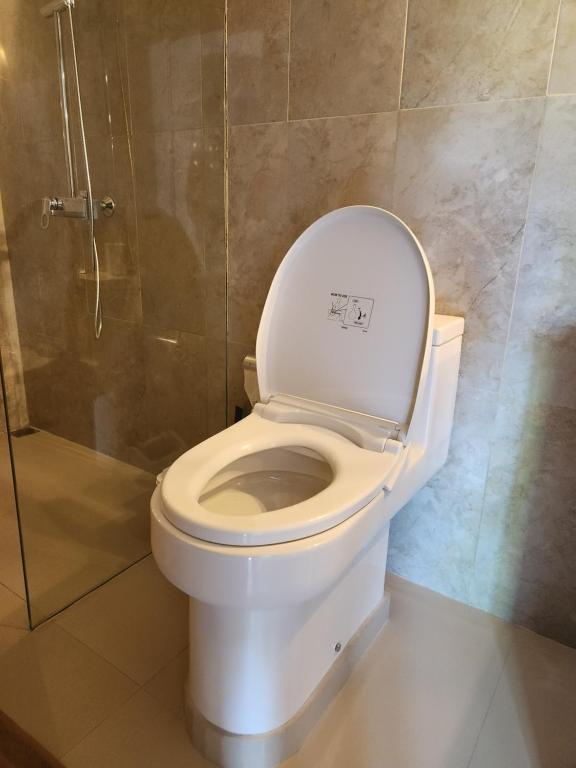Koupelna v ubytování Rumah Kanyuru