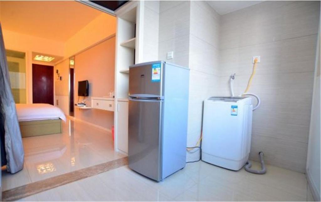 Kuchyň nebo kuchyňský kout v ubytování Nanning Qingzhou Rental Apartments