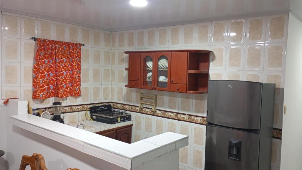 Η κουζίνα ή μικρή κουζίνα στο Apartamento #6