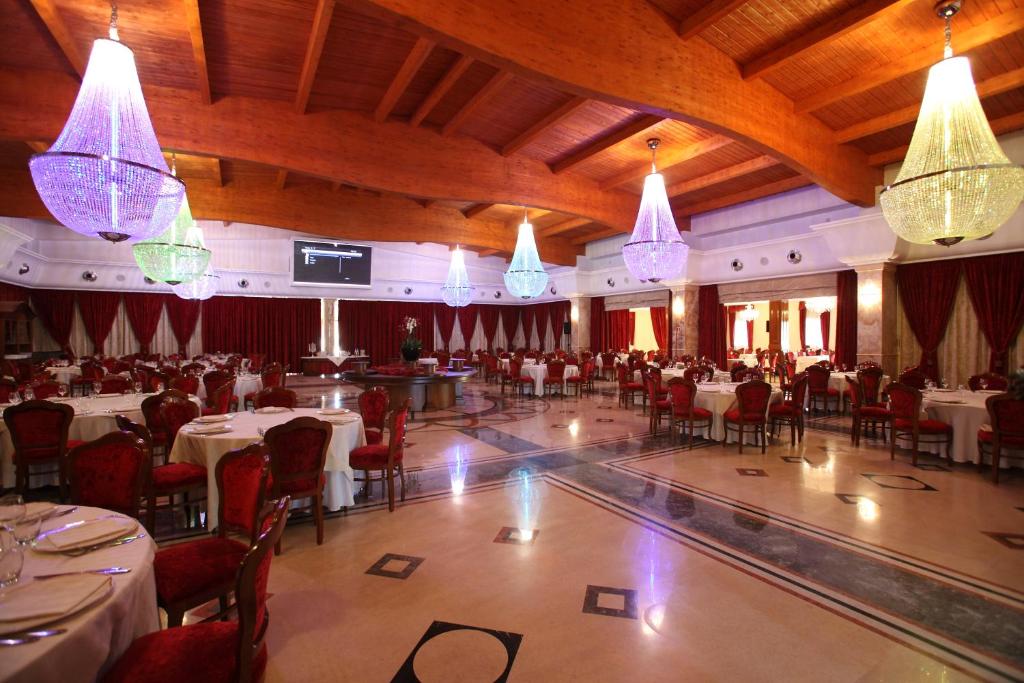 Restoran või mõni muu söögikoht majutusasutuses Hotel Borgo Don Chisciotte