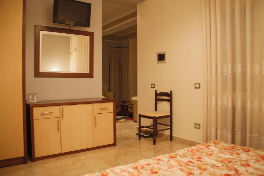 Postel nebo postele na pokoji v ubytování Grand Hotel