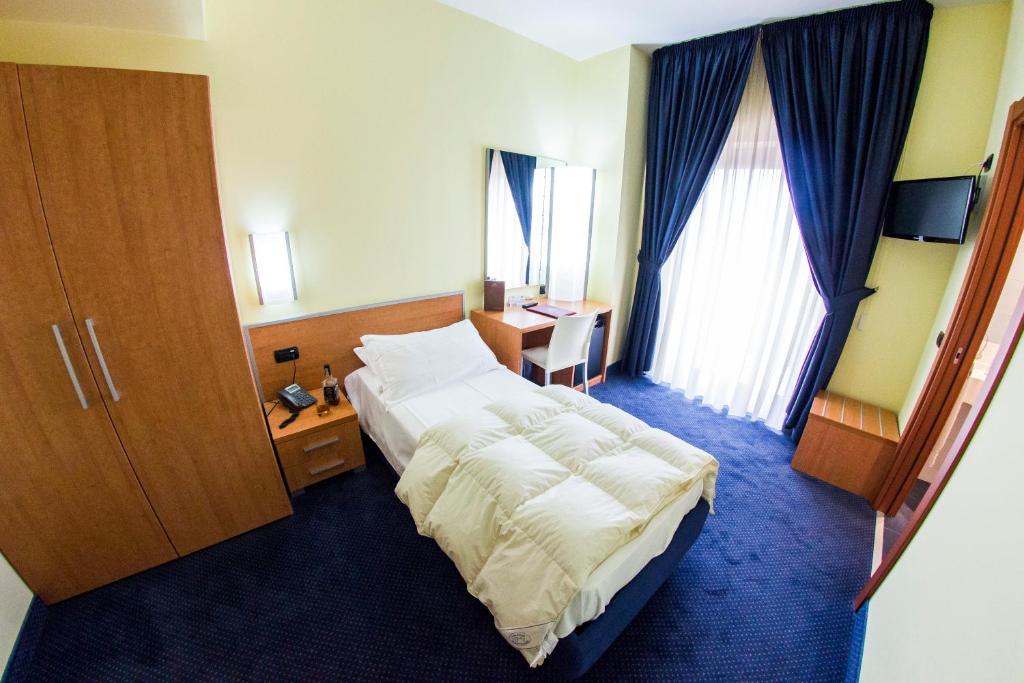 Postel nebo postele na pokoji v ubytování Best Western Hotel Class Lamezia