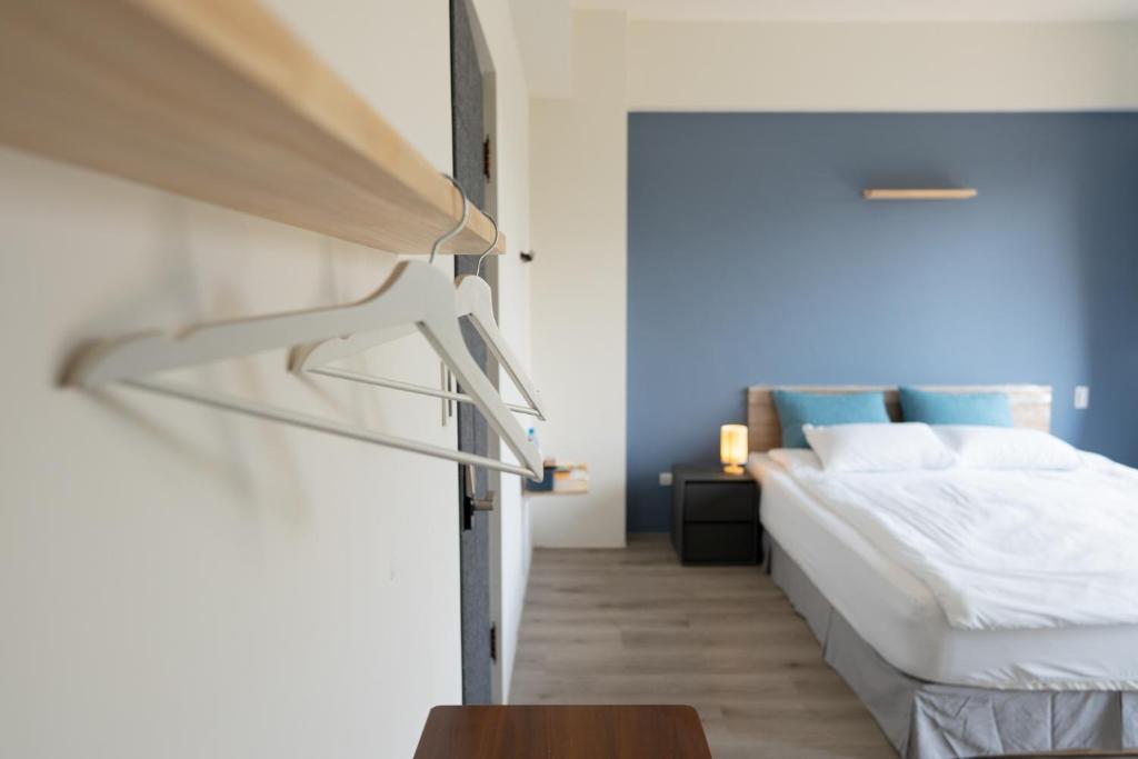 Postel nebo postele na pokoji v ubytování WuYou Guesthouse