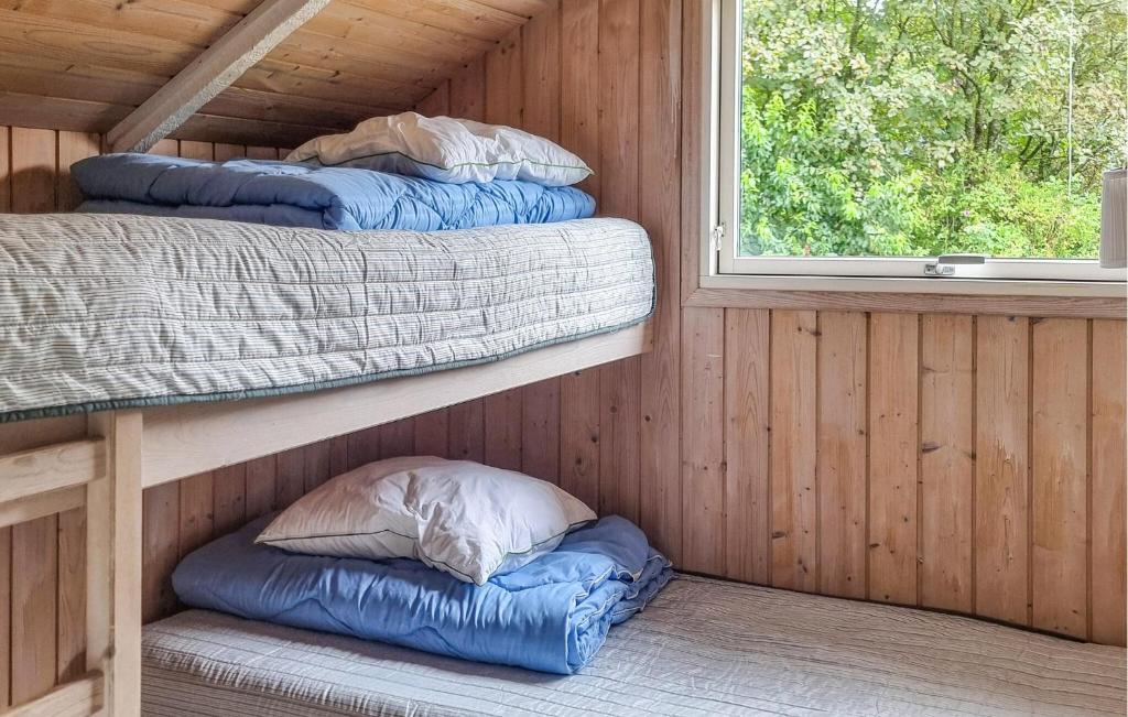 Postel nebo postele na pokoji v ubytování Holiday Home Blomstervangen Oksbøl